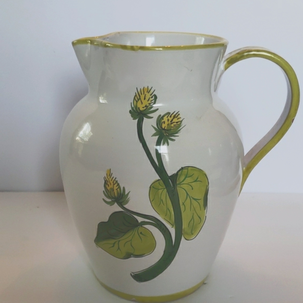 Italian handmade, hand pottery pitcher. White with yellow thistles green foliage
